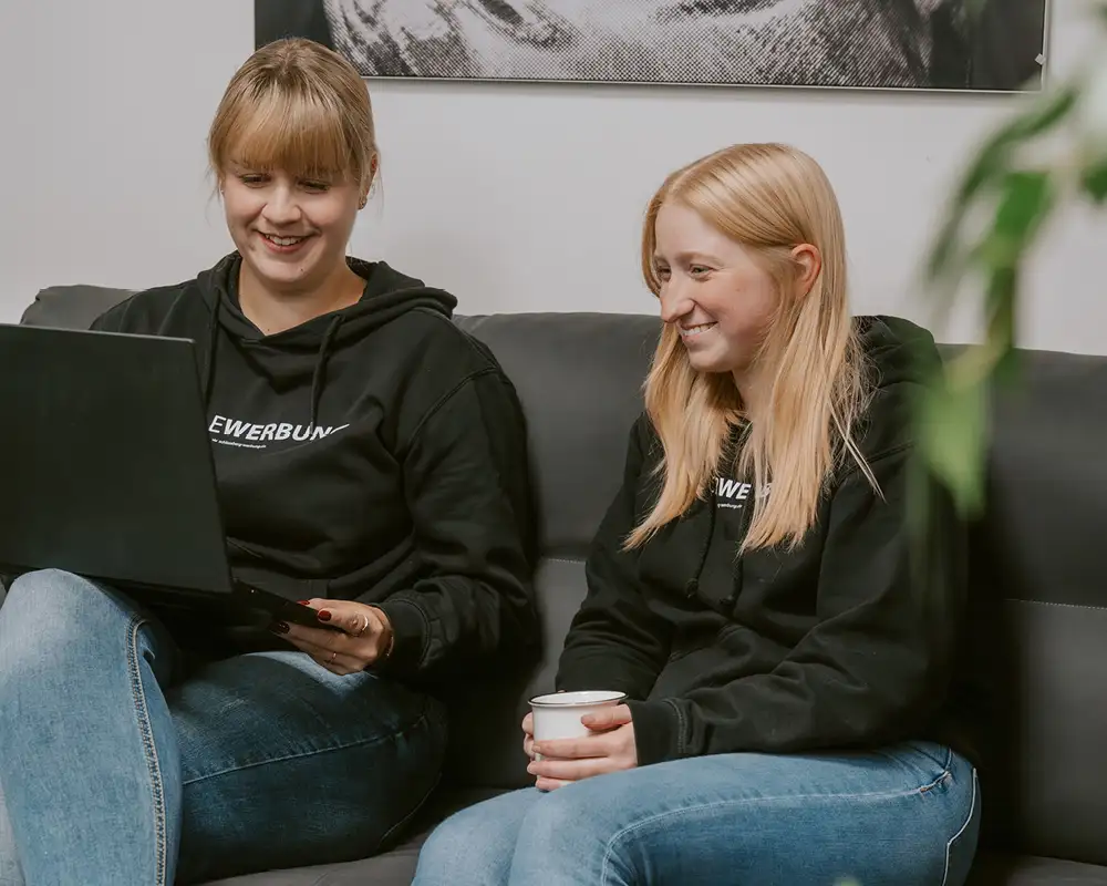 Hier sehen Sie die Mitarbeiter der Firma Schlossberg Werbung